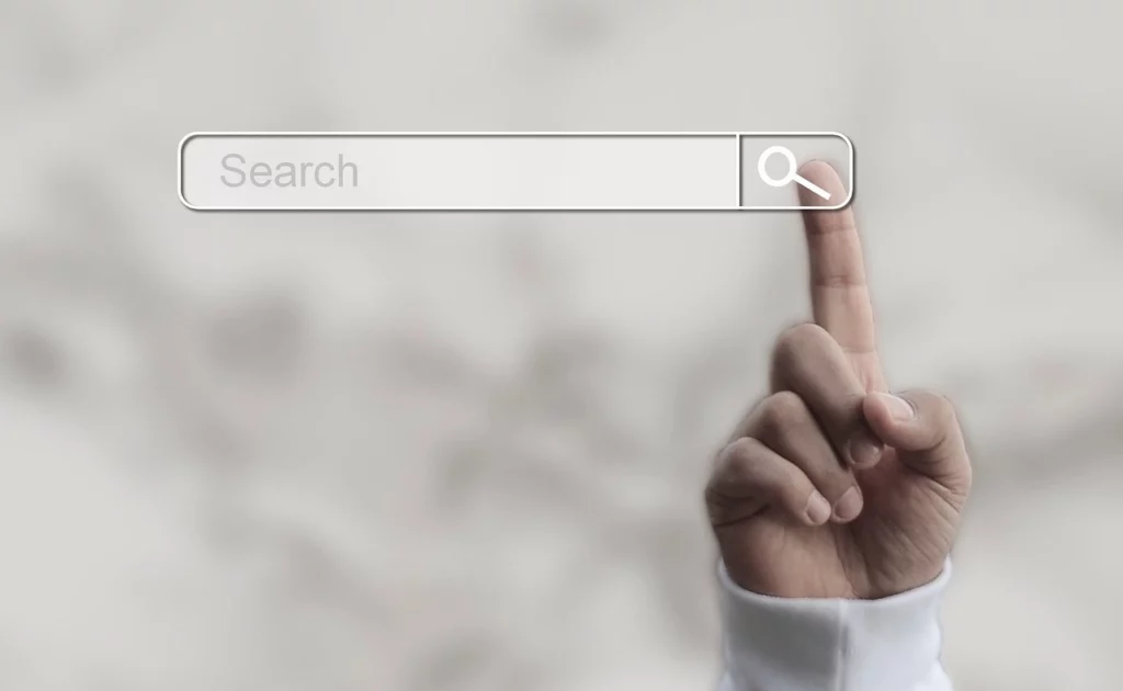 Barre de recherche avec un doigt